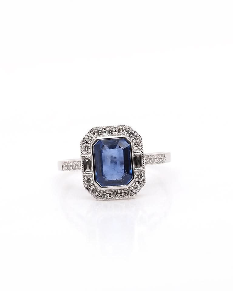 Ogden of Harrogate Jewellery 18ct White Gold Emerald-Cut Sapphire and Diamond Cluster Ring with Diamond Set Shoulders