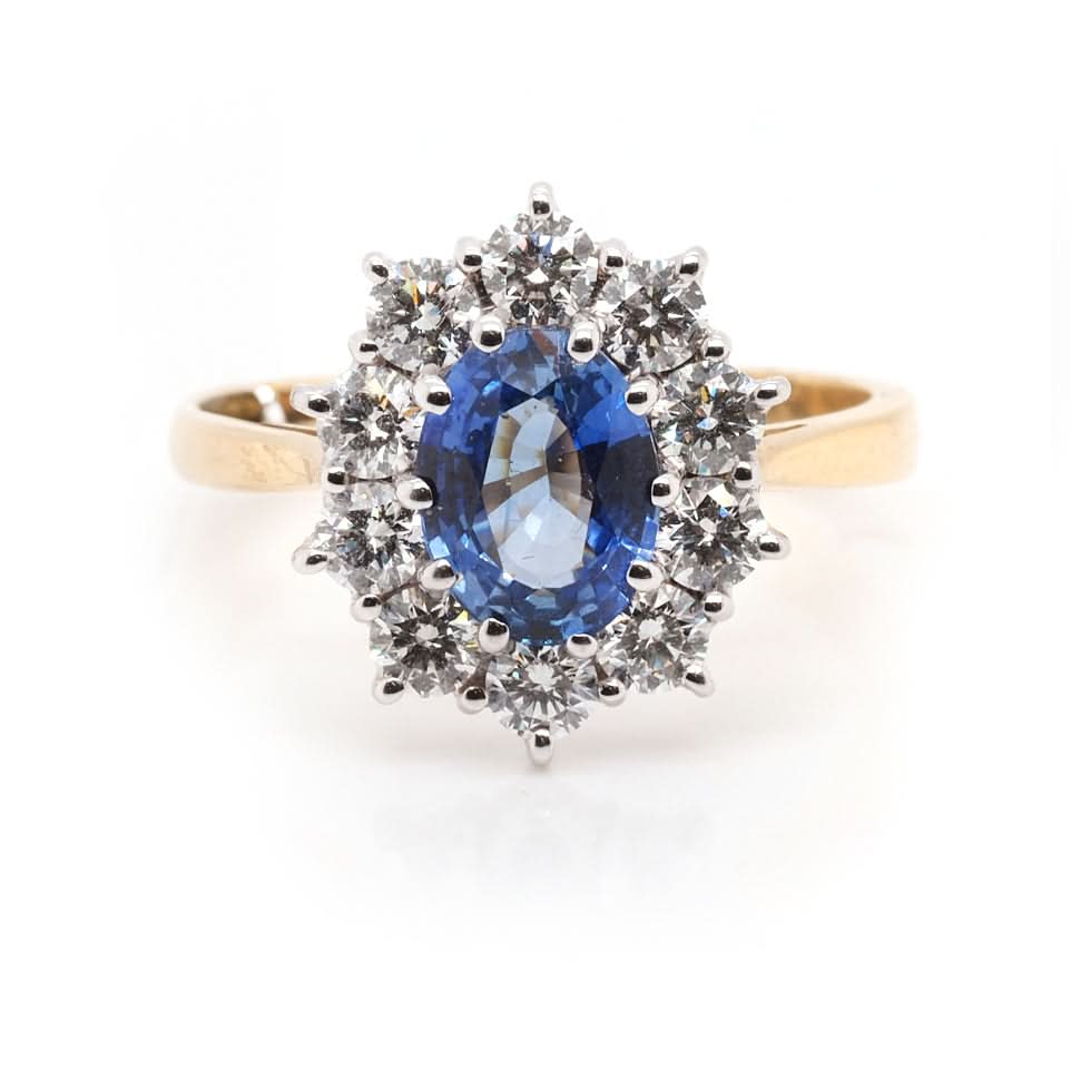 Ogden of Harrogate Jewellery 18ct Yellow Gold Oval Sapphire and Diamond Cluster Ring – 1.60ct Sapphire, 0.86ct Diamond