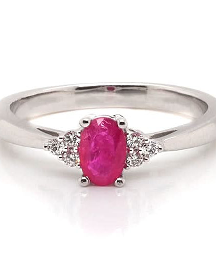Ogden of Harrogate Jewellery 9ct White Gold Oval Ruby Ring with Trefoil Diamond-Set Shoulders