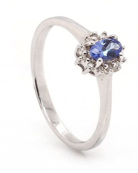 Ogden of Harrogate Jewellery 9ct White Gold Oval Tanzanite & Diamond Cluster Ring