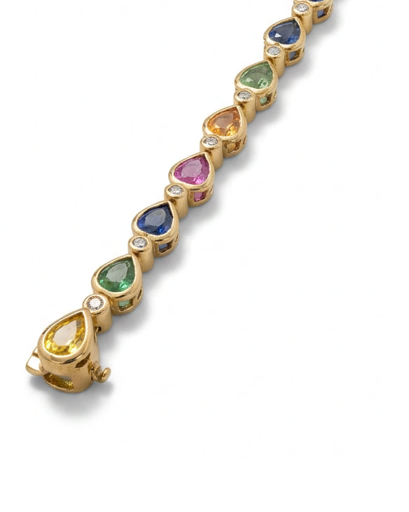 Ogden Of Harrogate Jewellery A Multi Stone Sapphire and Diamond Bracelet in 9ct Yellow Gold