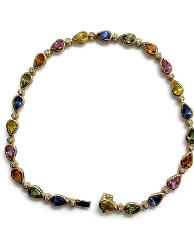 Ogden Of Harrogate Jewellery A Multi Stone Sapphire and Diamond Bracelet in 9ct Yellow Gold