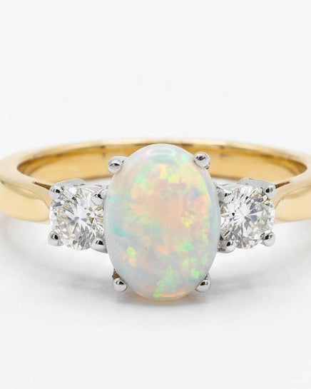 Ogden Of Harrogate Jewellery A Opal and Diamond Three Stone Dress Ring in 18ct Yellow Gold