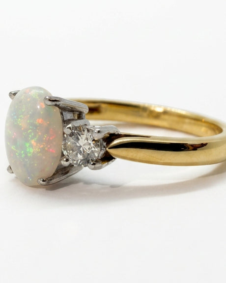 Ogden Of Harrogate Jewellery A Opal and Diamond Three Stone Dress Ring in 18ct Yellow Gold
