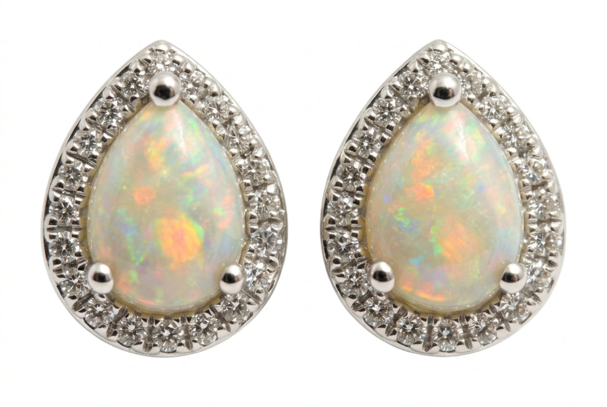 Ogden Of Harrogate Jewellery A Pair of Opal and Diamond Pear Shaped Earrings in 18ct White Gold