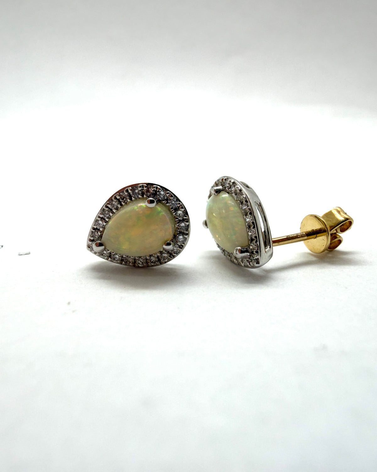 Ogden Of Harrogate Jewellery A Pair of Opal and Diamond Pear Shaped Earrings in 18ct White Gold