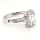 Ogden of Harrogate Jewellery A Platinum and Emerald Cut Diamond Cluster Ring