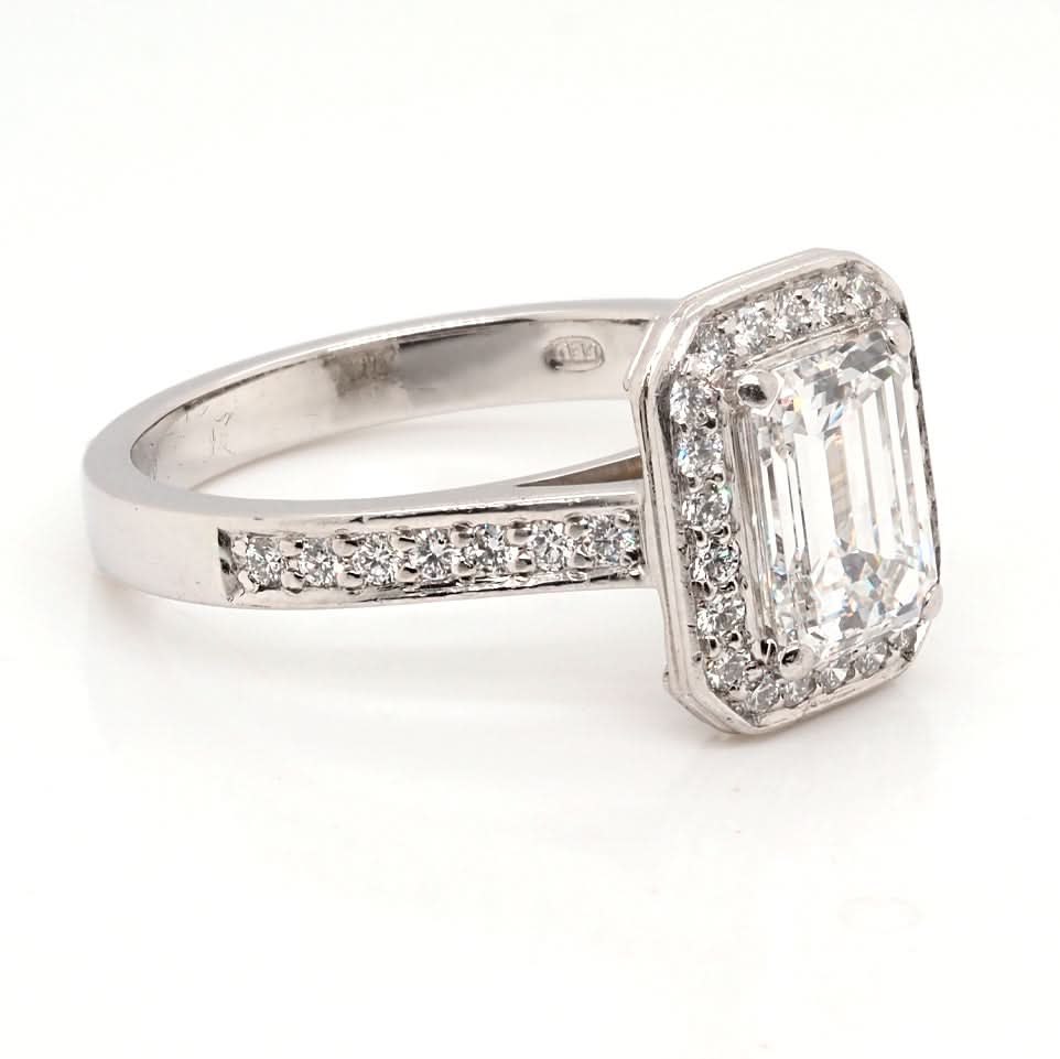 Ogden of Harrogate Jewellery A Platinum and Emerald Cut Diamond Cluster Ring