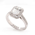 Ogden of Harrogate Jewellery A Platinum and Emerald Cut Diamond Cluster Ring