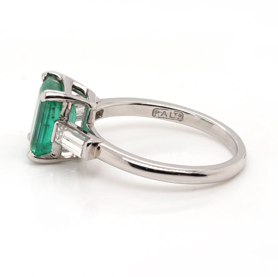 Ogden of Harrogate Jewellery A Platinum, Emerald and Diamond Three Stone Ring
