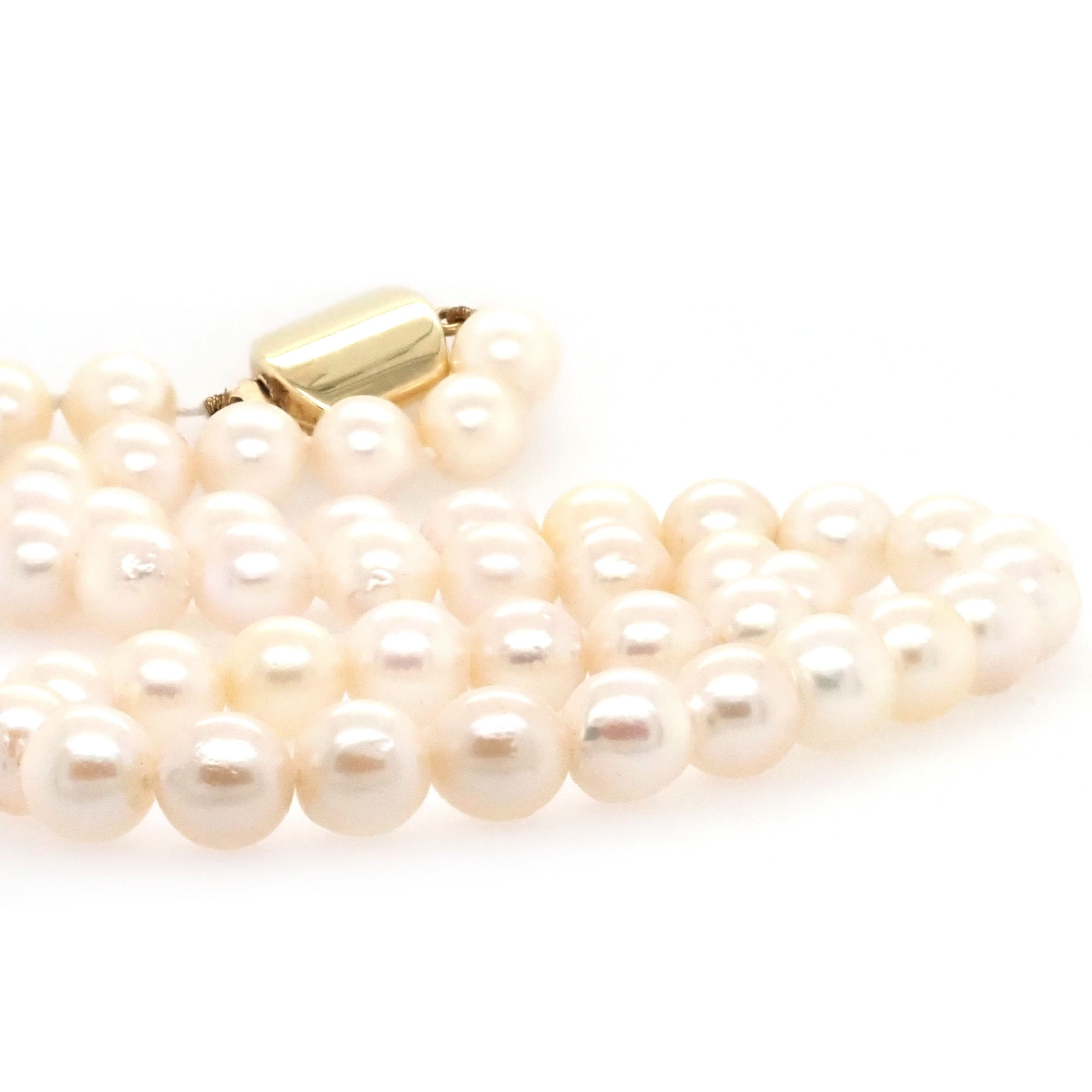 Ogden of Harrogate Jewellery A Row of Cultured Pearls Threaded on an 18ct Yellow Gold Clasp