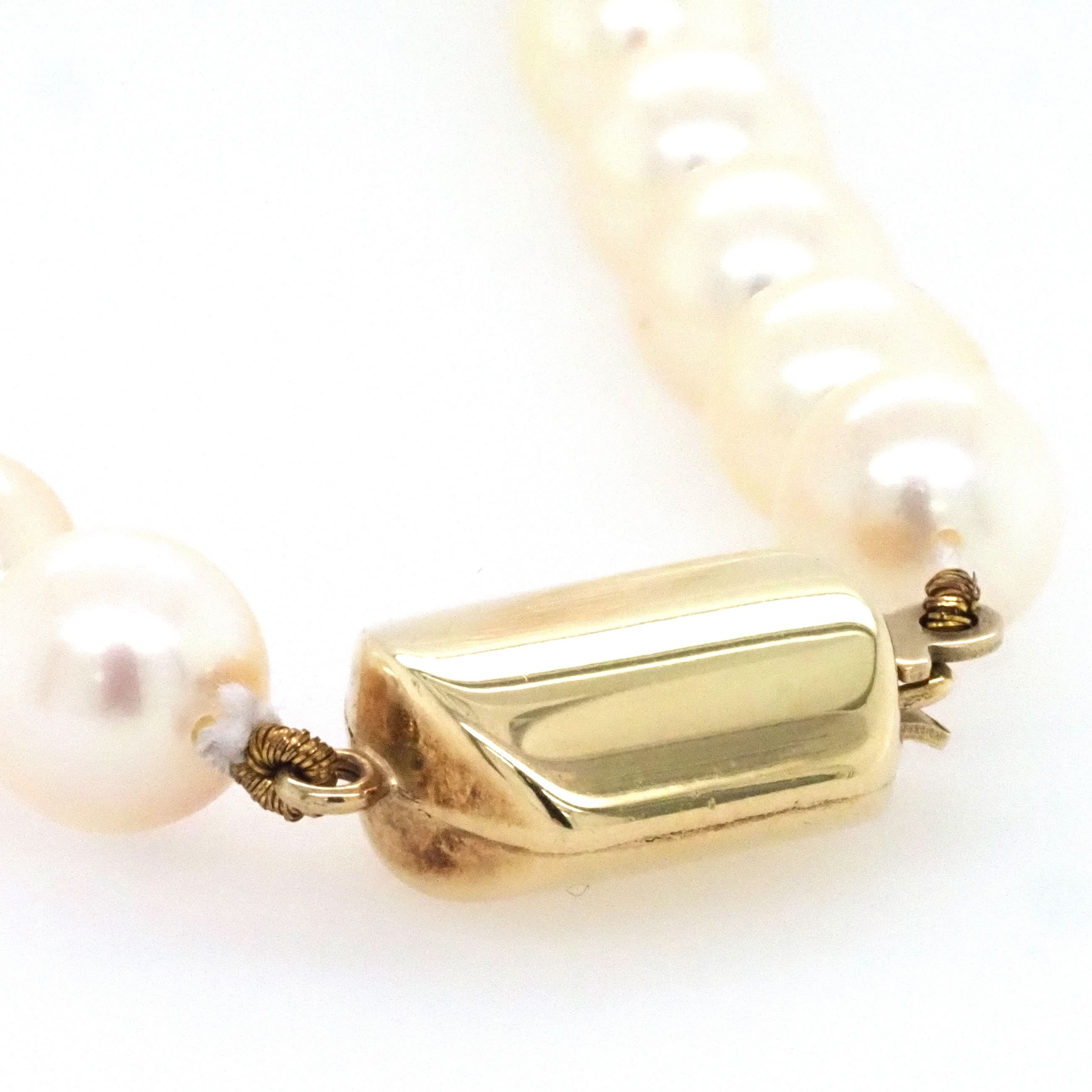 Ogden of Harrogate Jewellery A Row of Cultured Pearls Threaded on an 18ct Yellow Gold Clasp