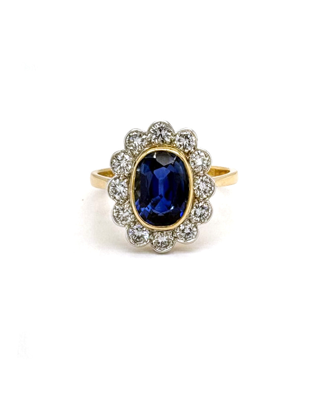 Ogden Of Harrogate Jewellery A Sapphire and Diamond Cluster Ring