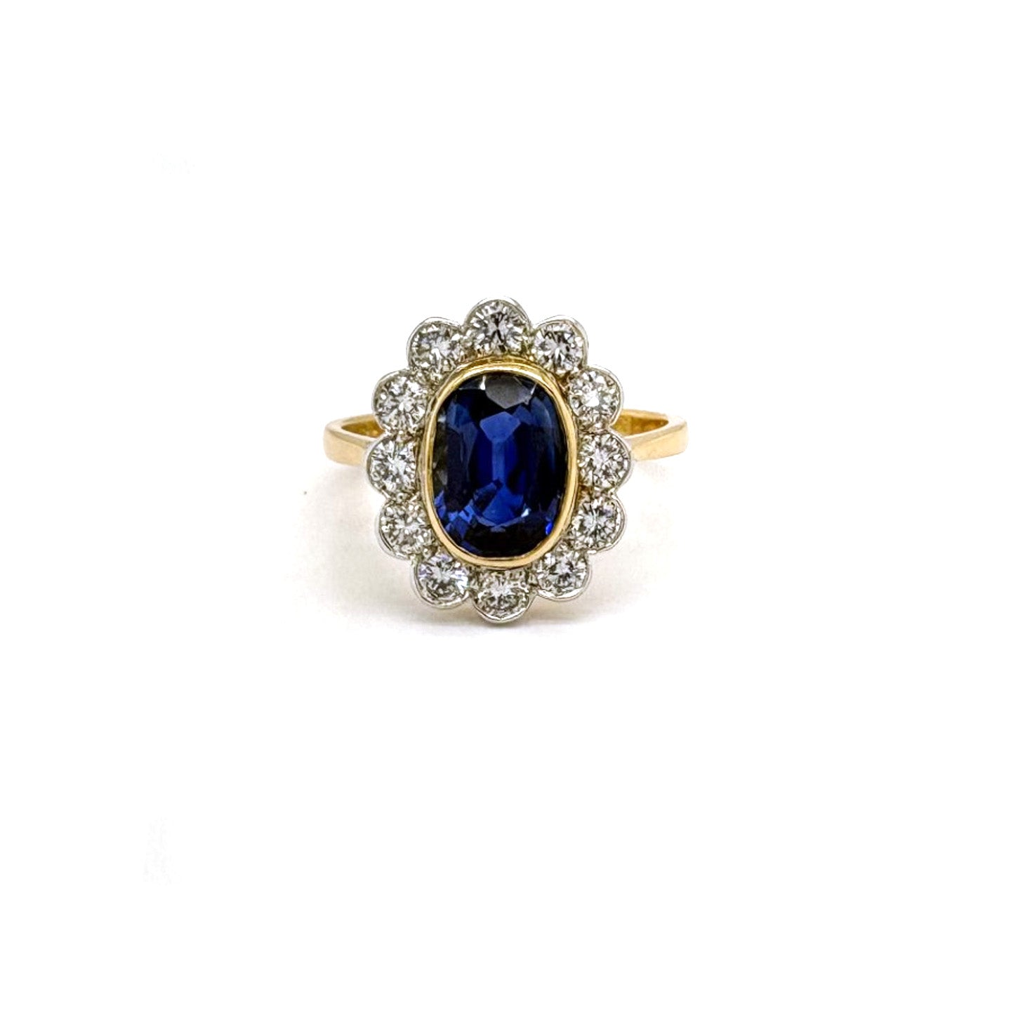 Ogden Of Harrogate Jewellery A Sapphire and Diamond Cluster Ring