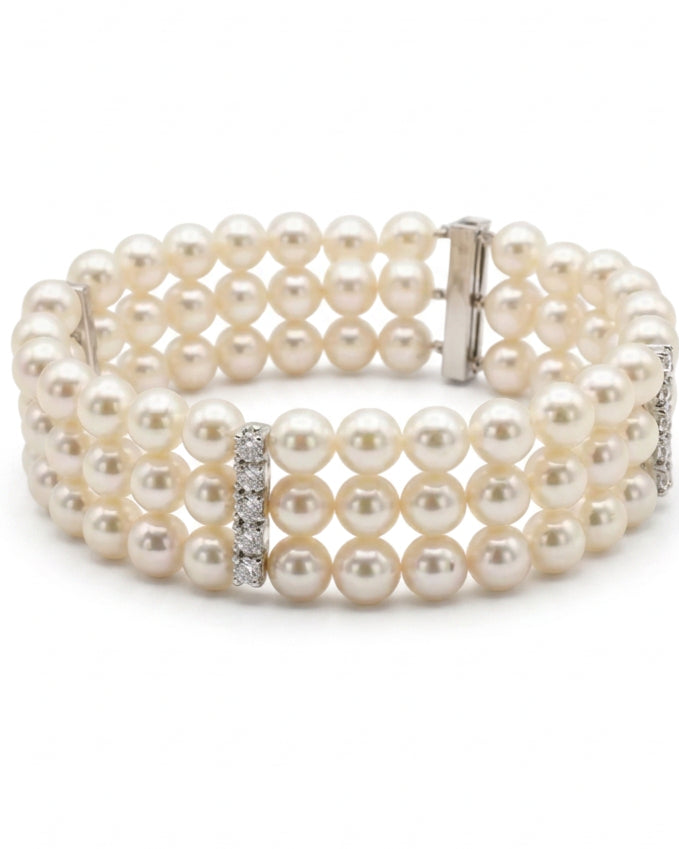 Ogden Of Harrogate Jewellery A Three Row Pearl Bracelet with Three Diamond Set Spacers