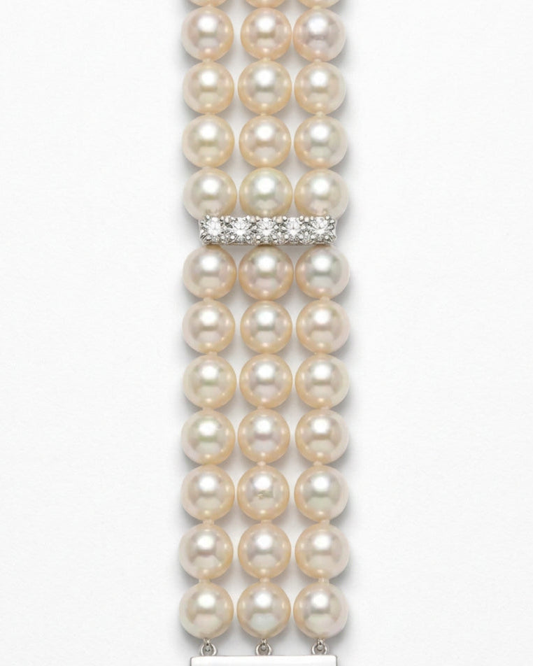 Ogden Of Harrogate Jewellery A Three Row Pearl Bracelet with Three Diamond Set Spacers
