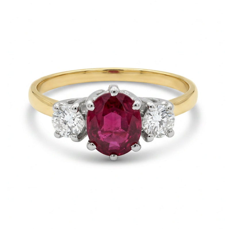 Ogden Of Harrogate Jewellery An 18ct Yellow Gold Ruby and Diamond Three Stone Ring