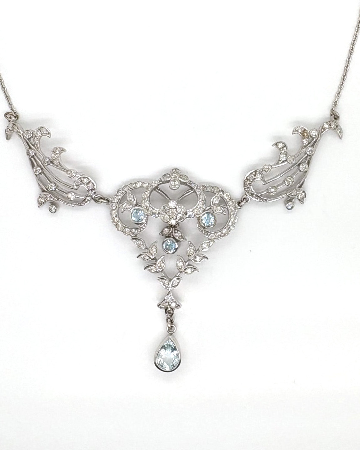 Ogden Of Harrogate Jewellery An Art Nouveau style Aquamarine and Diamond Collarette