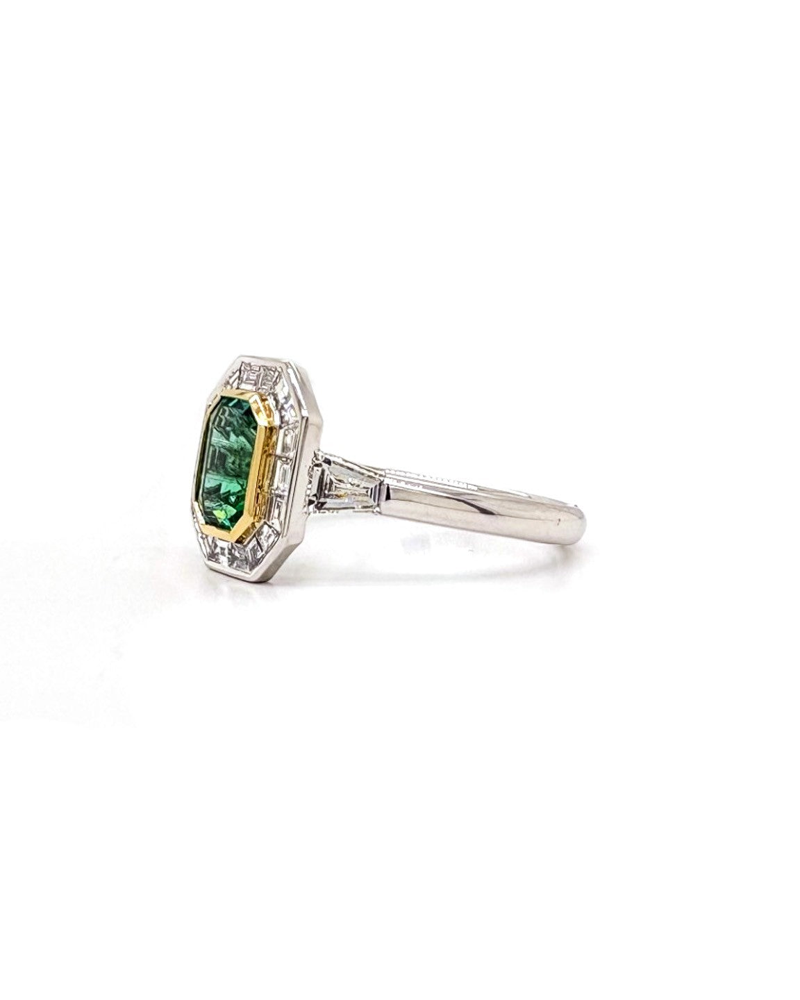 Ogden Of Harrogate Jewellery An Emerald and Diamond Cluster Ring