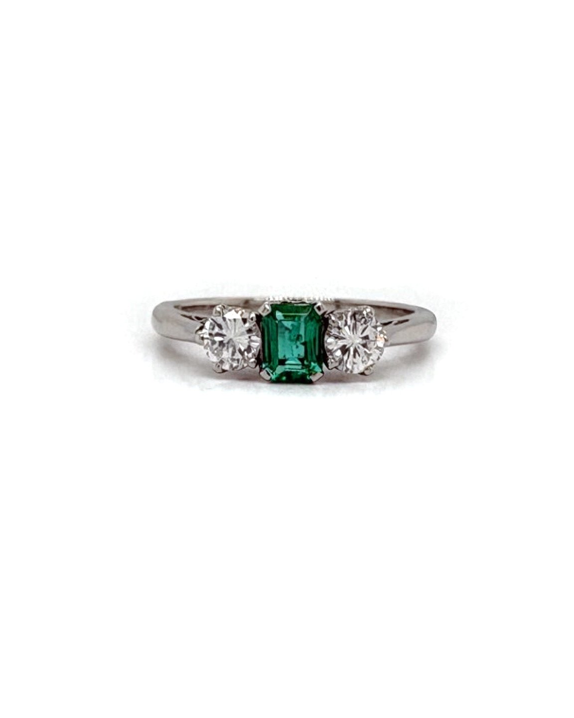 Ogden Of Harrogate Jewellery An Emerald and Diamond Three-stone Ring
