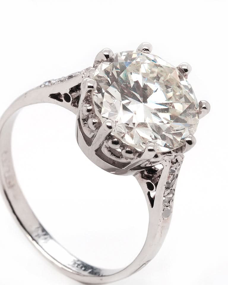 Ogden of Harrogate Jewellery Platinum Diamond Claw Set Solitaire Ring with Diamond Set Shoulders