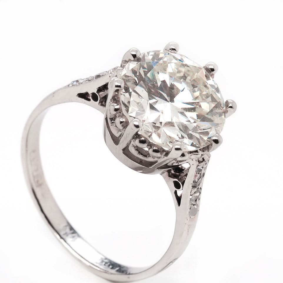 Ogden of Harrogate Jewellery Platinum Diamond Claw Set Solitaire Ring with Diamond Set Shoulders