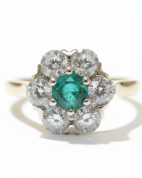 Ogden of Harrogate Jewellery Platinum Emerald and Diamond Cluster Ring