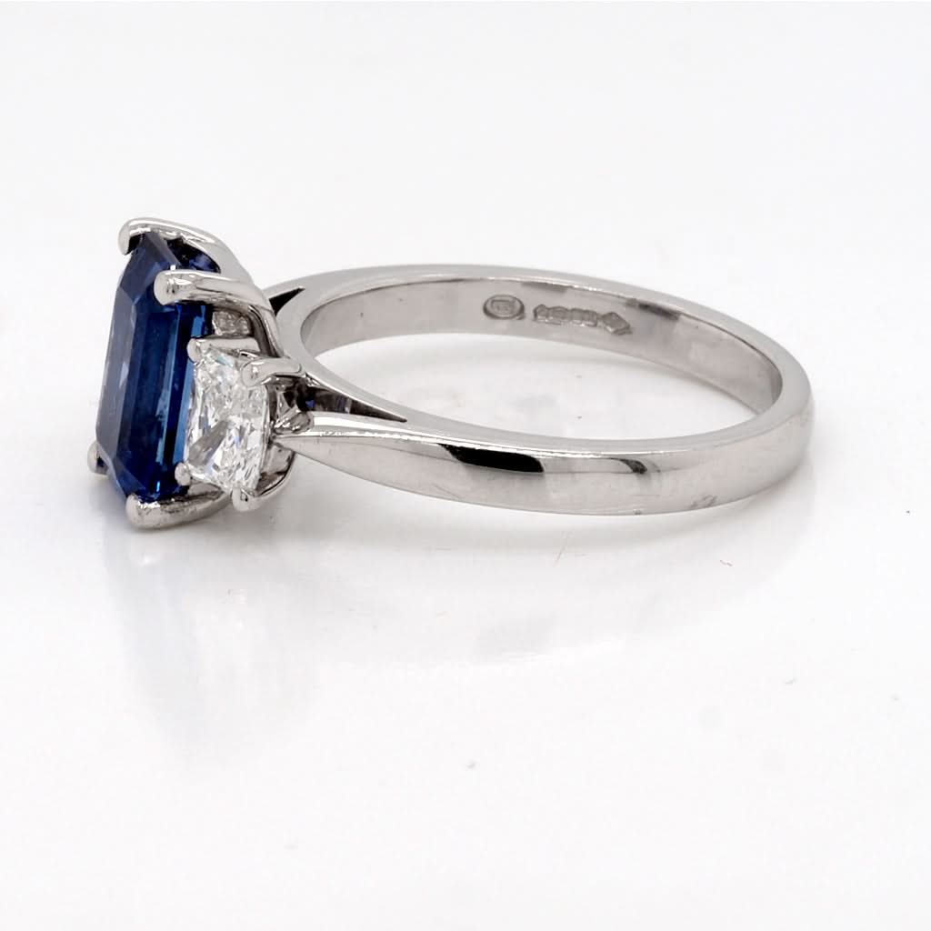 Ogden of Harrogate Jewellery Platinum Emerald-Cut Sapphire and Diamond Three-Stone Ring