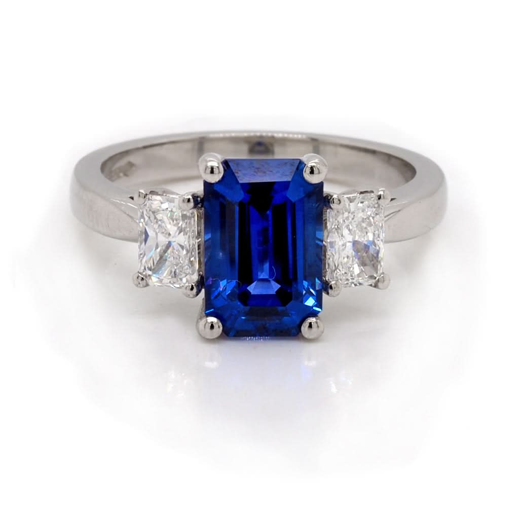 Ogden of Harrogate Jewellery Platinum Emerald-Cut Sapphire and Diamond Three-Stone Ring