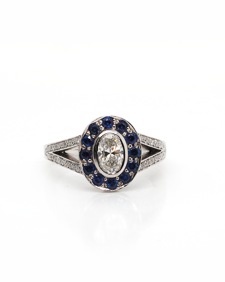 Ogden of Harrogate Jewellery Platinum Oval Diamond, Sapphire Halo & Diamond Shoulder Cluster Ring