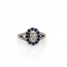 Ogden of Harrogate Jewellery Platinum Oval Diamond, Sapphire Halo & Diamond Shoulder Cluster Ring