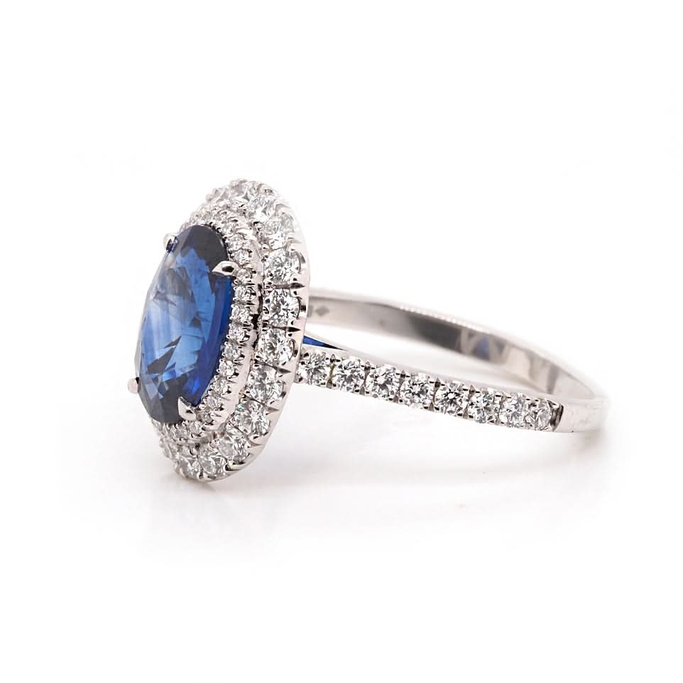 Ogden of Harrogate Jewellery Platinum Oval Sapphire and Diamond Cluster Ring with Diamond-Set Shoulders – 2.55ct Sapphire, 0.92ct Diamond