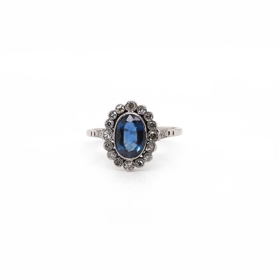 Ogden of Harrogate Jewellery Platinum Oval Sapphire & Diamond Cluster Ring with Diamond-Set Shoulders