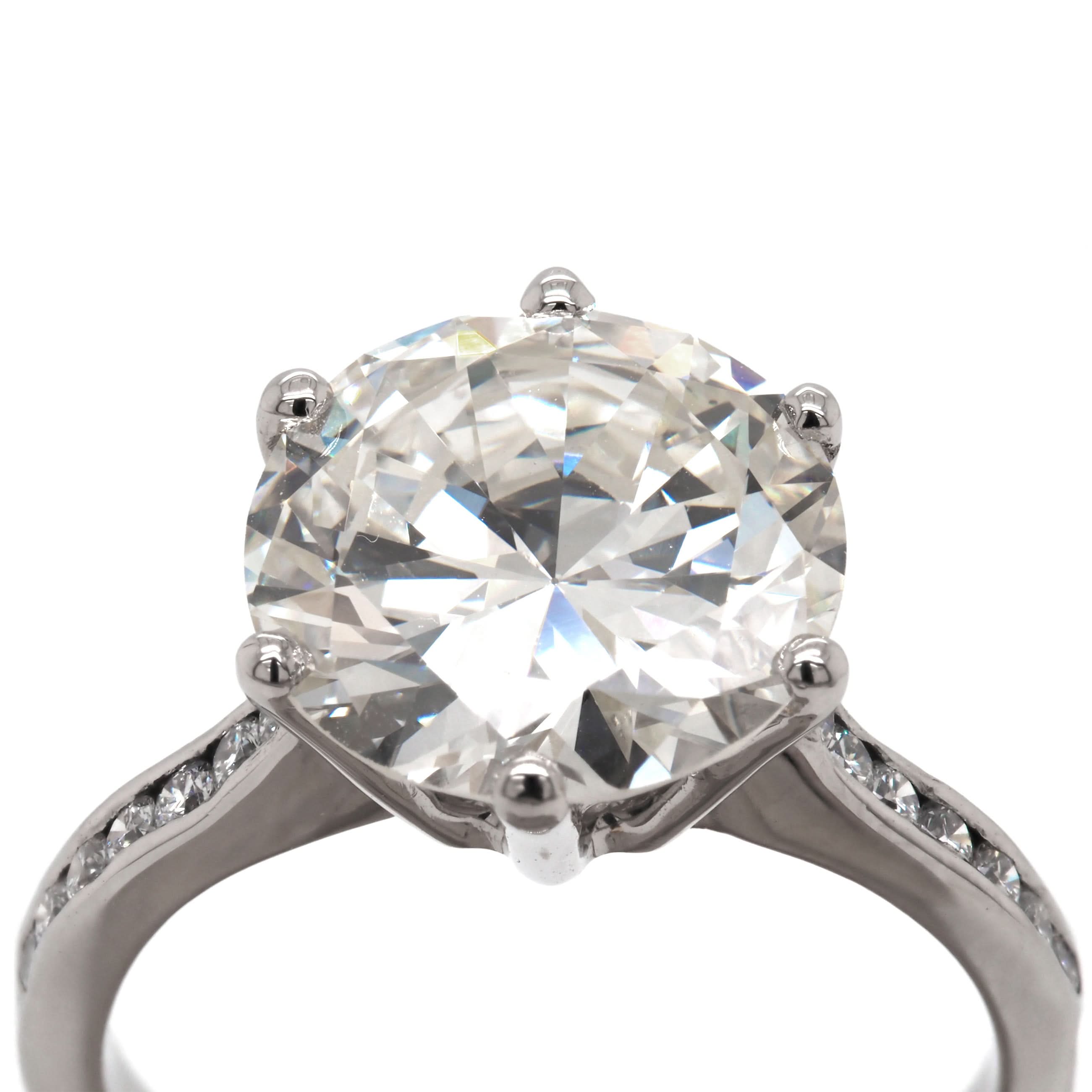 Ogden of Harrogate Jewellery Platinum Single-Stone Diamond Solitaire Ring with Diamond-Set Shoulders