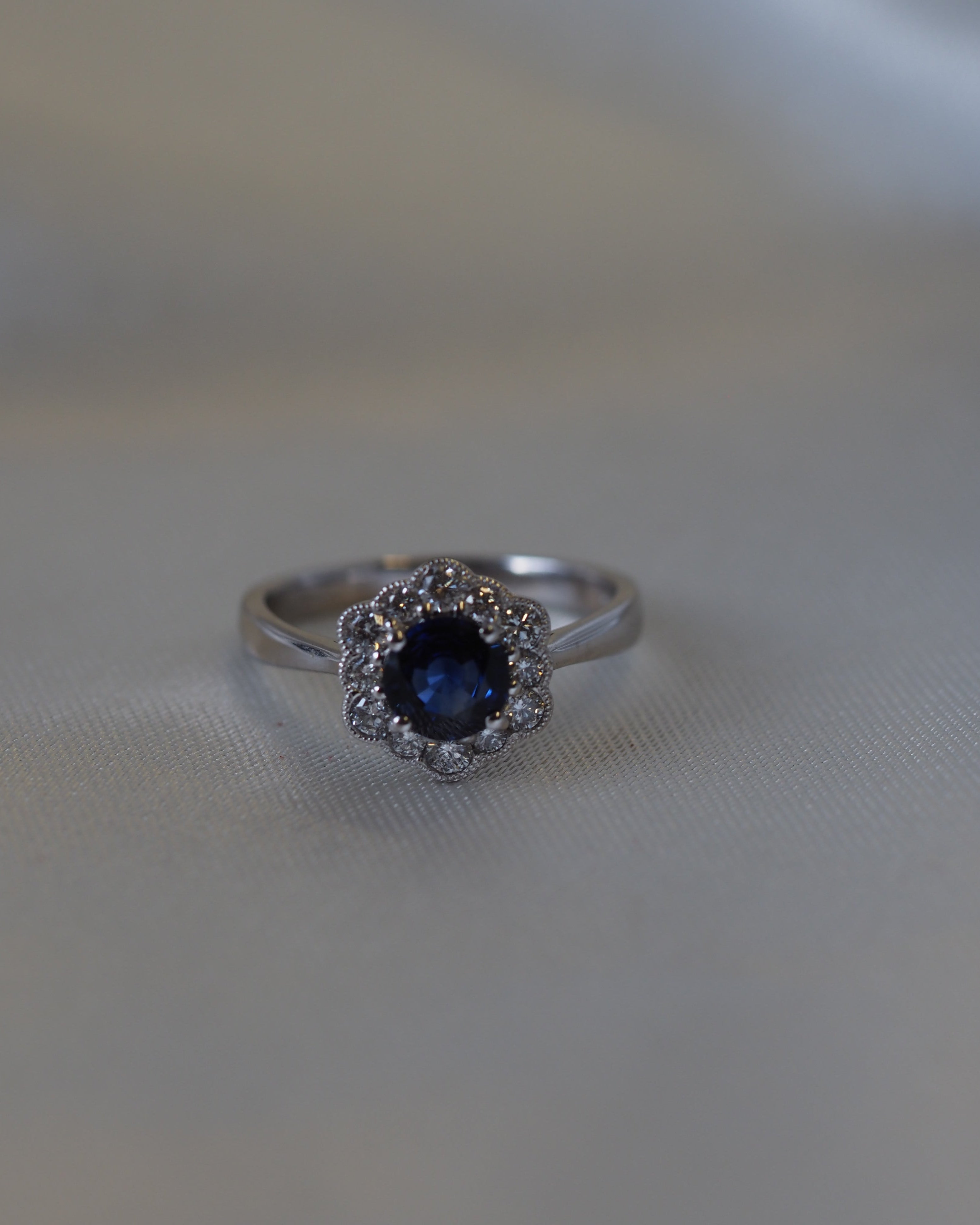 Ogden of Harrogate Jewellery Sapphire and Diamond Cluster Ring in 18ct White Gold