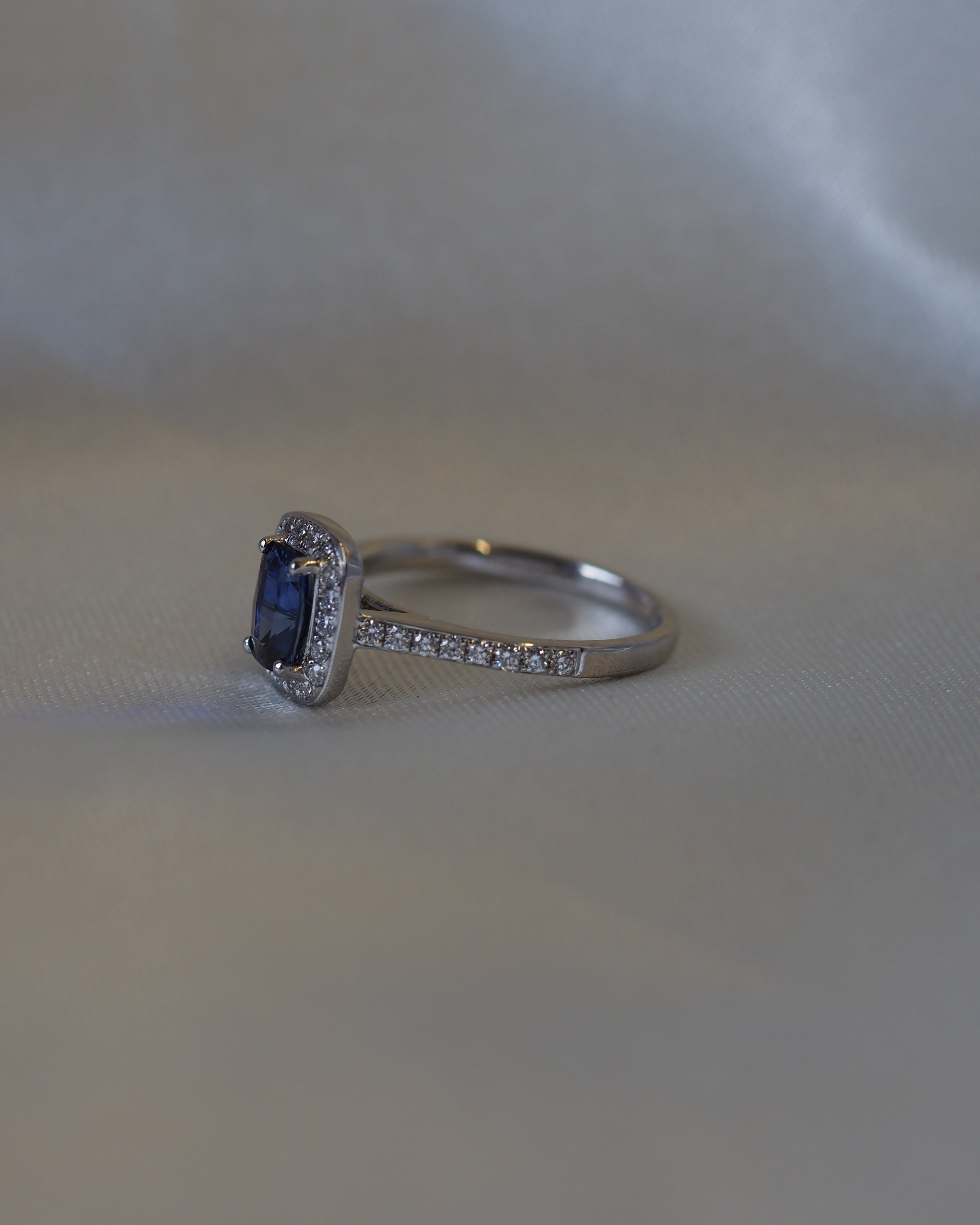 Ogden of Harrogate Jewellery Sapphire and Diamond Halo Ring in 18ct White Gold