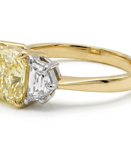 Ogden Of Harrogate Vintage Jewellery A Fancy Yellow Diamond Three Stone Ring in 18ct Yellow and White Gold
