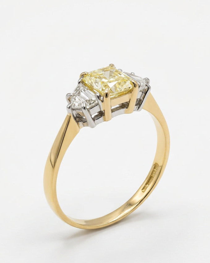 Ogden Of Harrogate Vintage Jewellery A Fancy Yellow Diamond Three Stone Ring in 18ct Yellow and White Gold