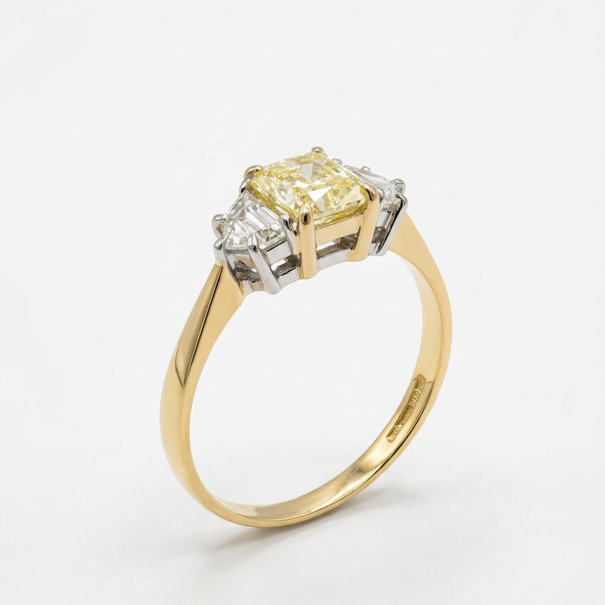 Ogden Of Harrogate Vintage Jewellery A Fancy Yellow Diamond Three Stone Ring in 18ct Yellow and White Gold