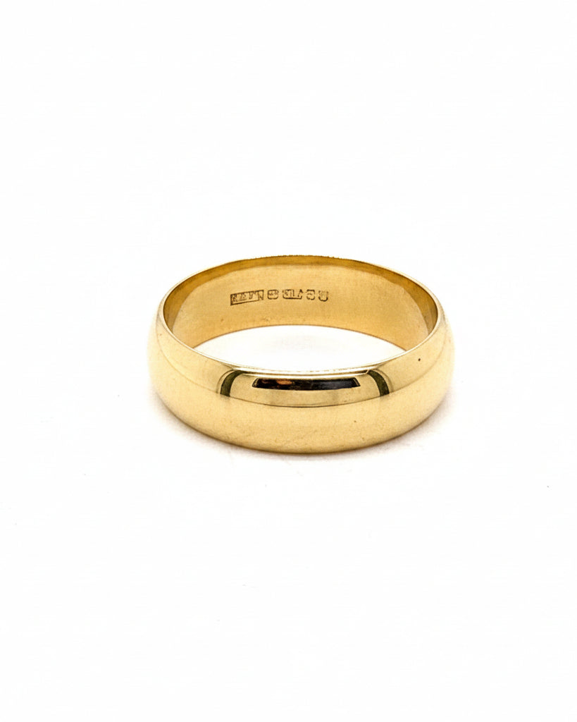 Ogden Of Harrogate Vintage Jewellery An 18ct yellow gold Wedding Band