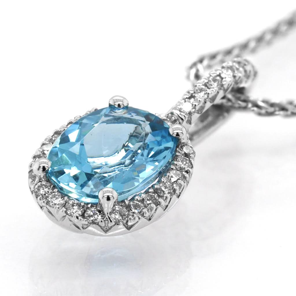 Ogden of Harrogate Jewellery 18ct White Gold Oval Aquamarine and Diamond Cluster Pendant