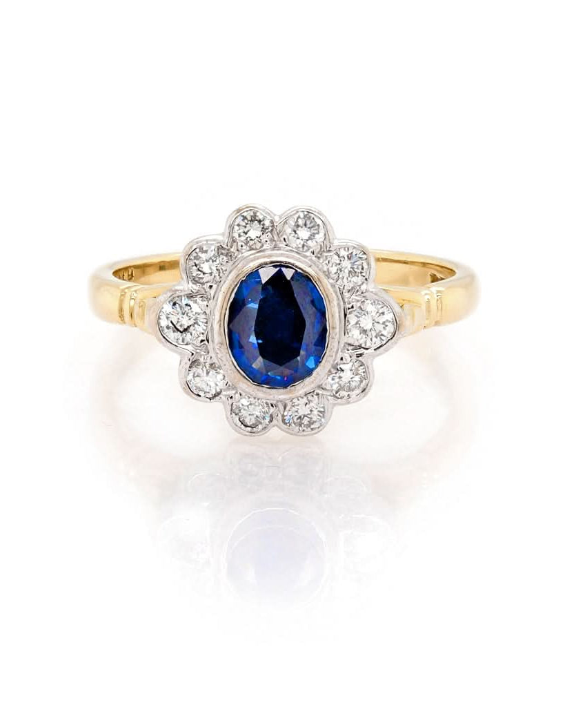 Ogden of Harrogate Jewellery 18ct Yellow Gold, Oval Sapphire and Diamond Cluster Ring