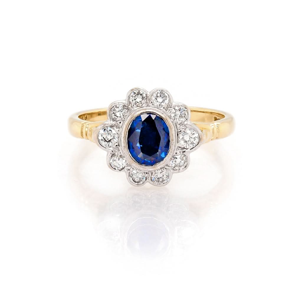 Ogden of Harrogate Jewellery 18ct Yellow Gold, Oval Sapphire and Diamond Cluster Ring