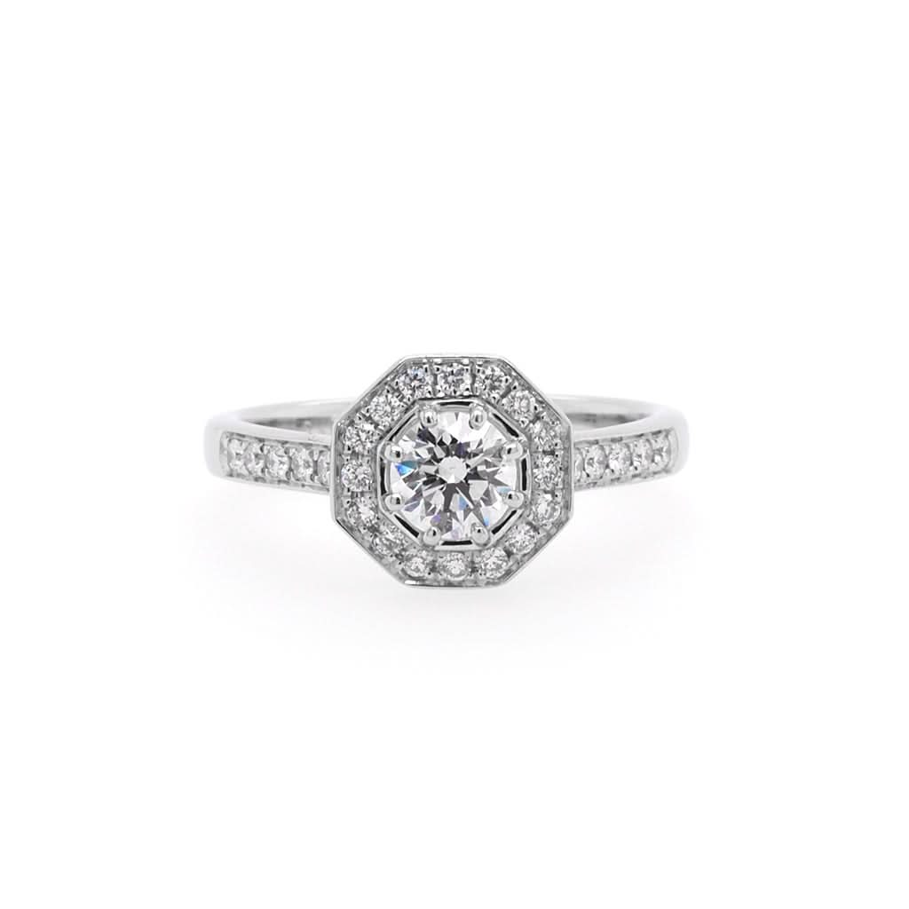 Ogden of Harrogate Jewellery A Platinum Brilliant-Cut Octagonal Diamond Cluster Ring with Diamond-Set Shoulders