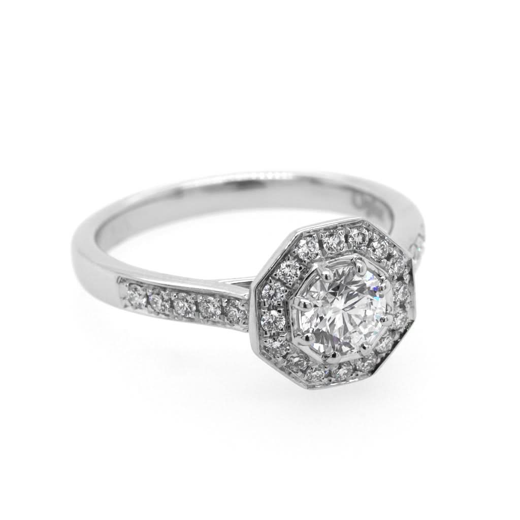 Ogden of Harrogate Jewellery A Platinum Brilliant-Cut Octagonal Diamond Cluster Ring with Diamond-Set Shoulders