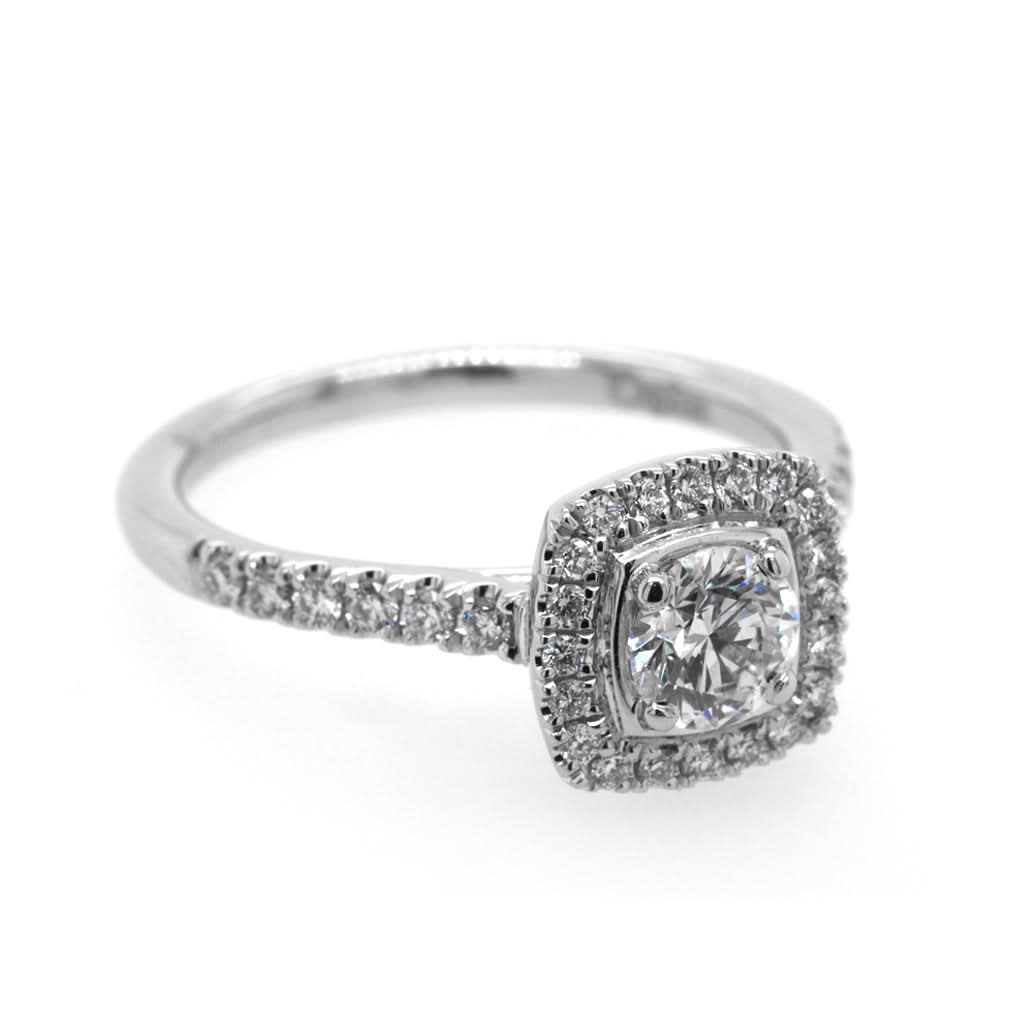 Ogden of Harrogate Jewellery A Platinum Brilliant-Cut Round Diamond Cluster Ring with Diamond Shoulders