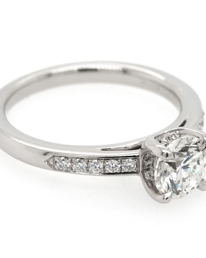 Ogden of Harrogate Jewellery A platinum, single stone, brilliant cut diamond ring wth diamond shoulders 1.00cts
