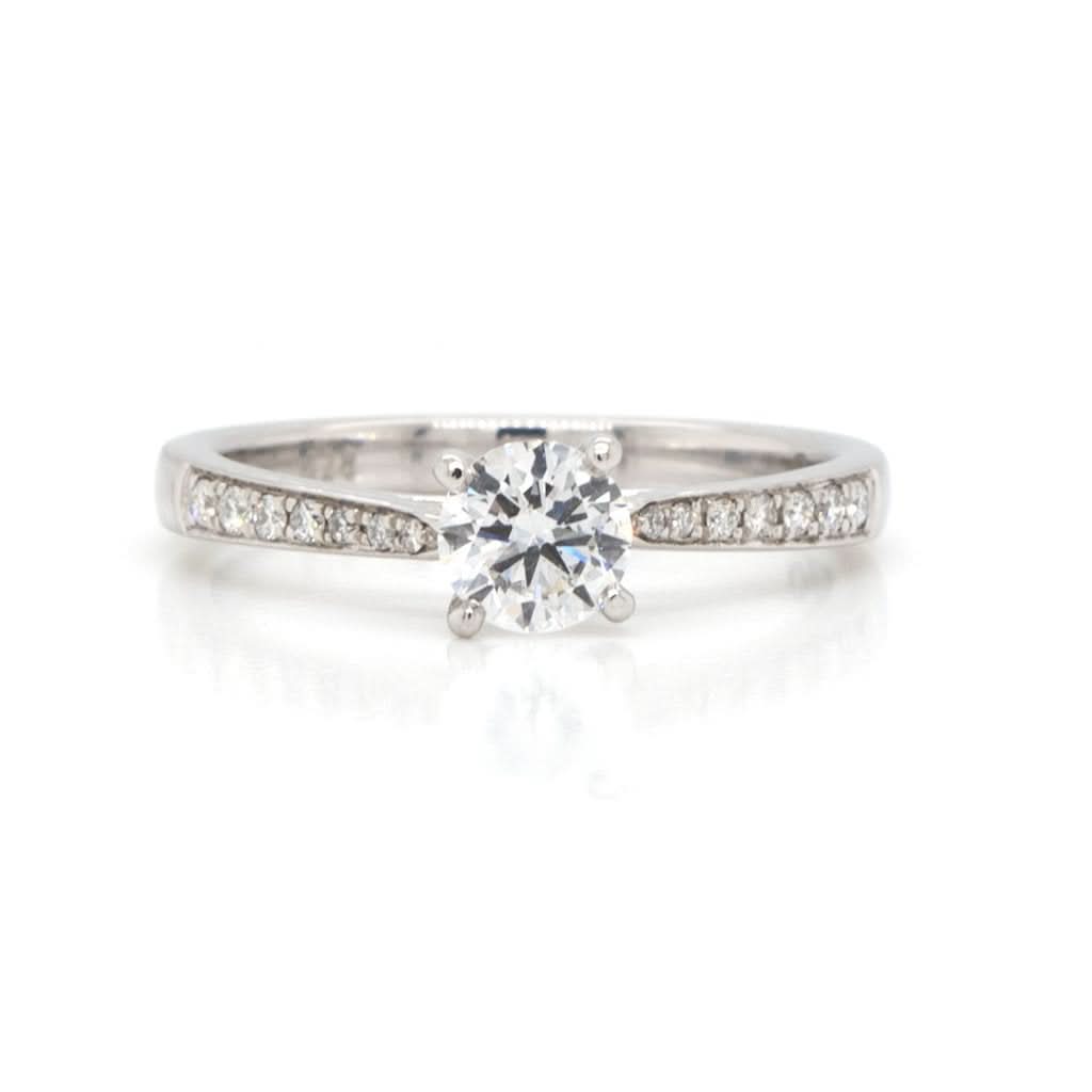 Ogden of Harrogate Jewellery A Platinum Single Stone Diamond Ring with Diamond-set Shoulders
