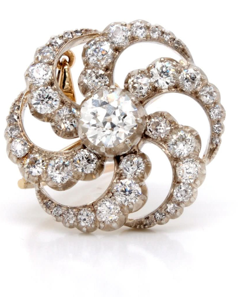Ogden of Harrogate Jewellery A stunning Edwardian Gold, silver and Diamond Catherine Wheel Brooch Pendant, c.1910