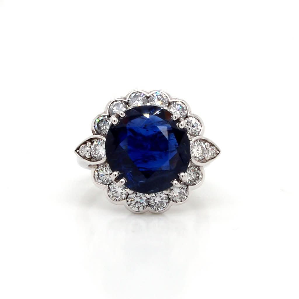Ogden of Harrogate Jewellery An 18ct Gold Burmese Sapphire and Diamond Cluster Ring